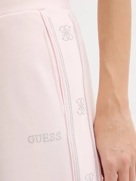 Спортивні штани Guess OCTAVIA з аплікацією рожевий