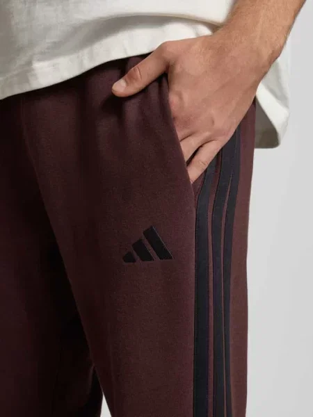 Spodnie dresowe o kroju slim fit z dodatkiem model ‘SHAB’ Adidas Sportswear
