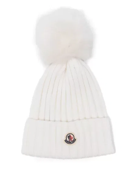 Căciulă Moncler cu pompoane