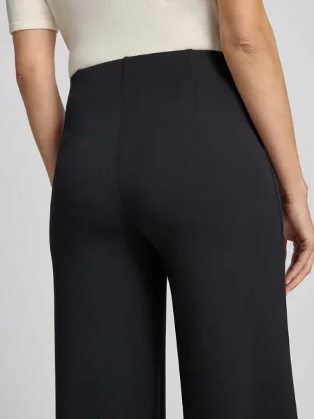 Spodnie o kroju wide fit z ozdobnymi szwami Christian Berg Woman czarne