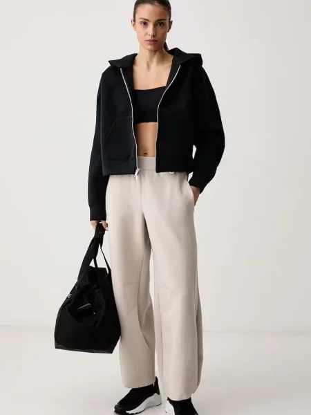 Nike kalhoty na trénink Impossibly Soft Dri-FIT béžové