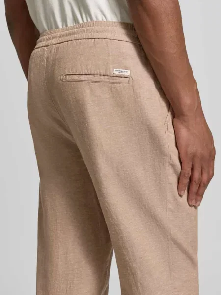 Spodnie z domieszką lnu i francuskimi wpuszczanymi Scotch & Soda