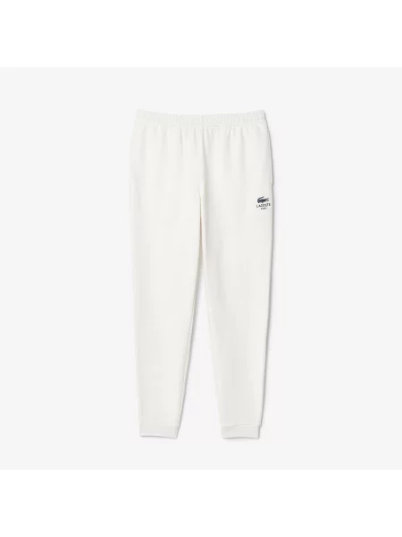 Lacoste Spodnie Dresowe Ze Zwężanymi Nogawkami niebieskie