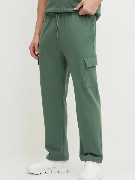 Bombažen spodnji del trenirke The North Face zelena