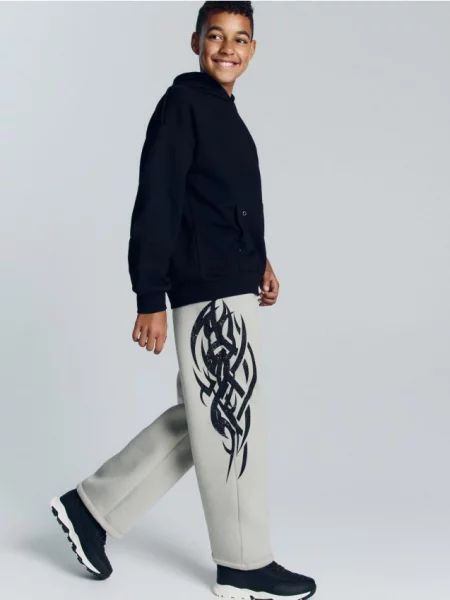 Reserved Pantaloni largi cu imprimeu deschis gri