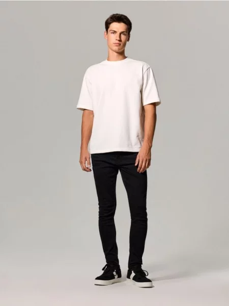 Sinsay Džíny skinny se sepraným efektem černá