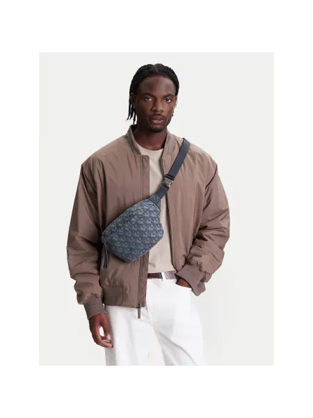 Torbica za okrog pasu﻿ Calvin Klein Jeans Unstructured Monogram Waistbag Svetlo modra