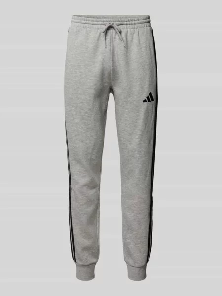 Spodnie dresowe o kroju relaxed fit z wyhaftowanym logo Adidas Sportswear