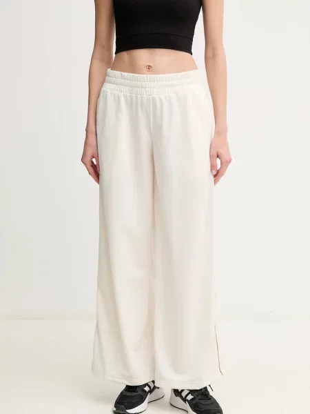 Puma spodnie dresowe gładkie beżowy