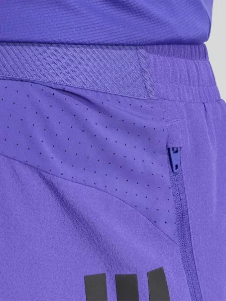 Szorty sportowe o kroju regular fit z nadrukiem z logo Adidas Training fioletowe