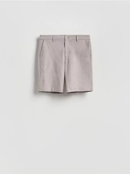 Reserved Pantaloni scurți carrot fit bej