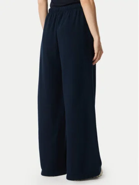 Tommy Jeans Spodnji del trenirke Script Mornarsko Wide Leg modra