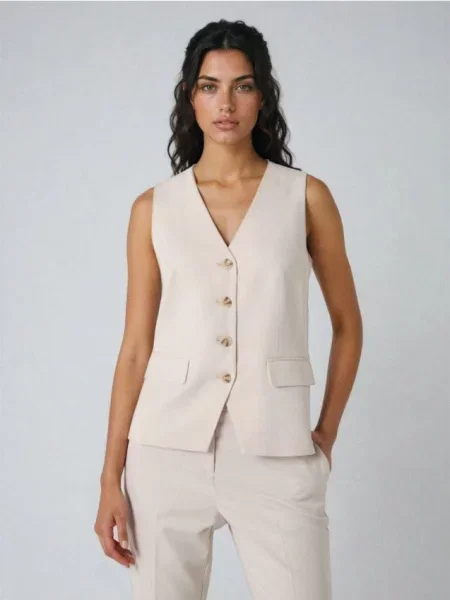 Костюмний жилет нюдовий