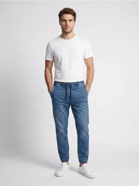 Sinsay Slim fit jogger džíny s efektem vyprání modrá