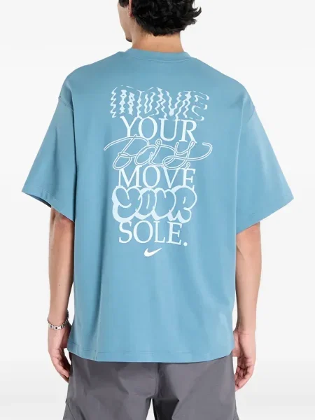 Top sportowy Nike prążkowany niebieski