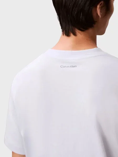 Графічний футболка Calvin Klein Jeans блакитна