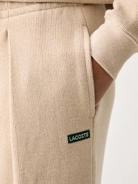 Sportnadrág Lacoste bézs