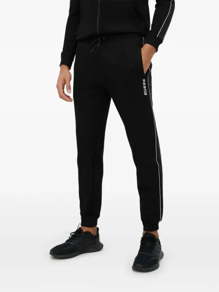 Pantaloni Guess cu dungi alergare negru