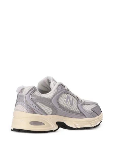 Haftowana kurtka New Balance w paski zielona