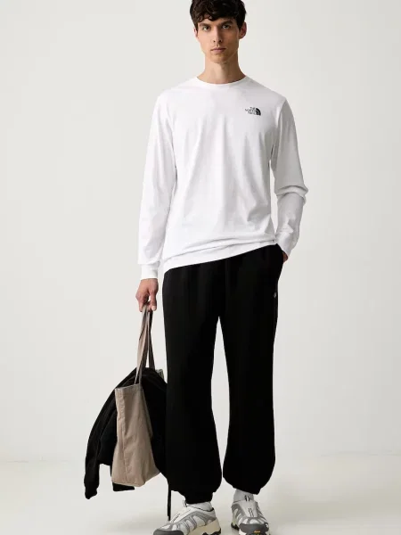 The North Face trenirka z bombažem Essential črna