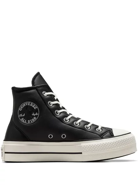 Iš natūralios odos sportbačiai Converse Chuck 70 izoliuoti ant pleištinio kulniuko pilka
