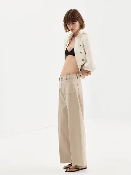 Jeansy wide leg z naszytymi piaskowy Kobieta 44 MANGO