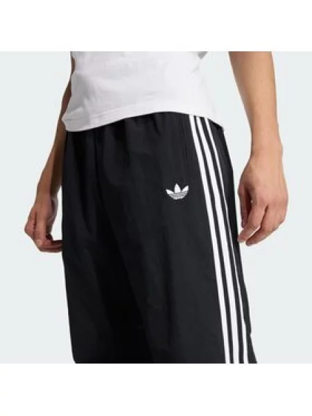 Adidas Spodnji del trenirke Firebird Woven črna