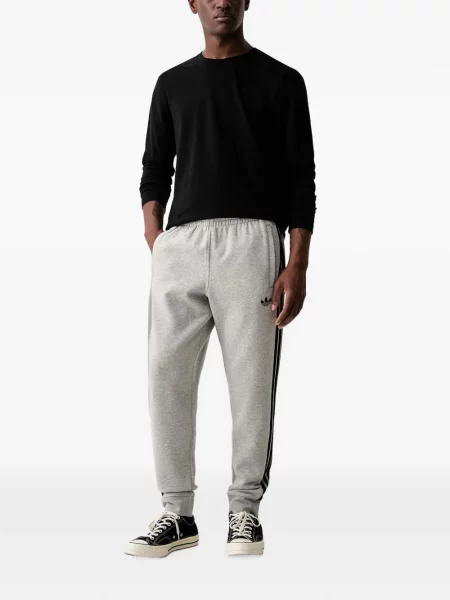 Pantaloni Adidas cu dungi cu platformă cu imagine negru