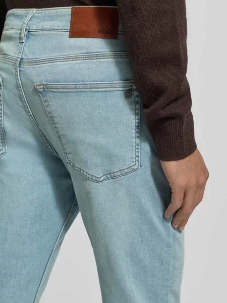 Jeansy o kroju tapered fit z mieszanki bawełny model ‘ONYX’ Boss Orange niebieski