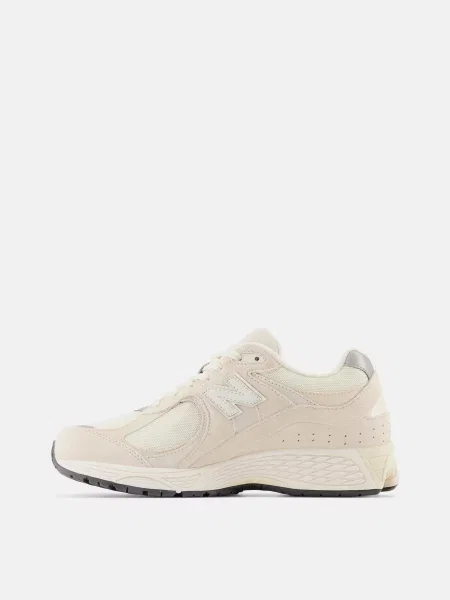 Кожаные кроссовки New Balance бежевые