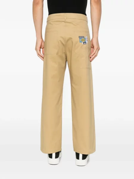 Pantaloni Moschino cu buzunare aplicate cu autograf