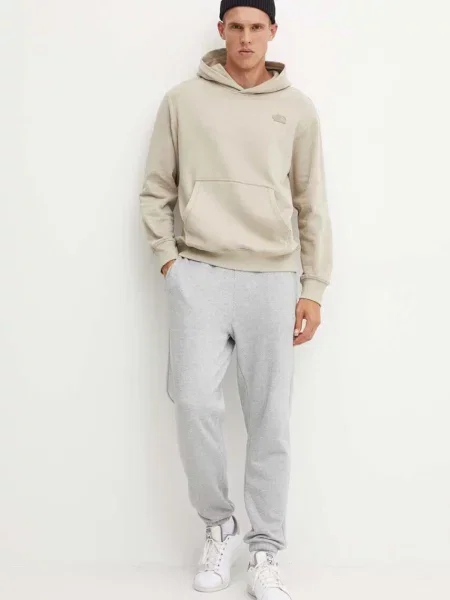 Bombažen pulover The North Face Natural Dye Hoodie s kapuco bež