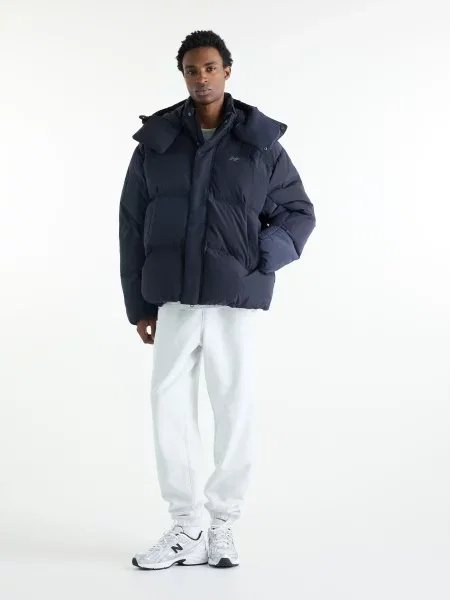 Пуховик New Balance синий