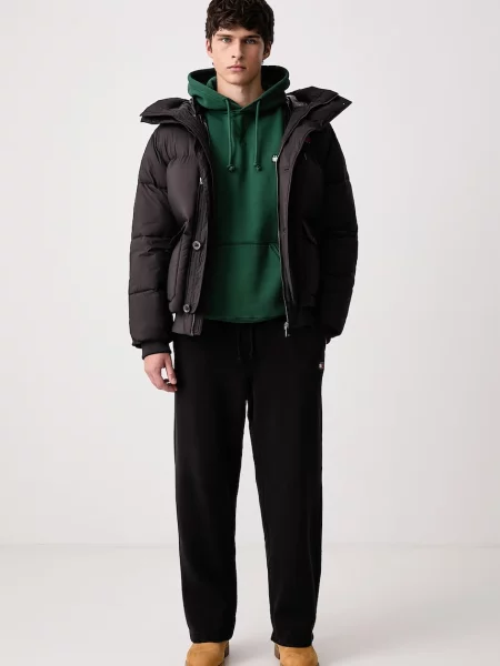 Tommy Jeans pulover s kapuco z bombažem zelena
