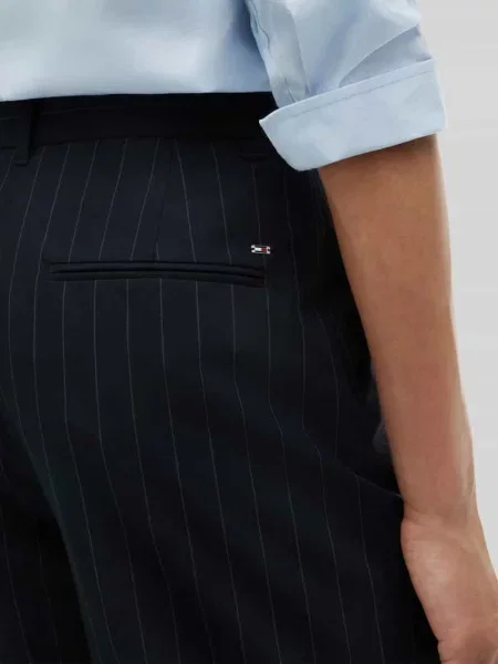 Spodnie biznes z wysokim stanem z detal z logo Tommy Hilfiger niebieskie