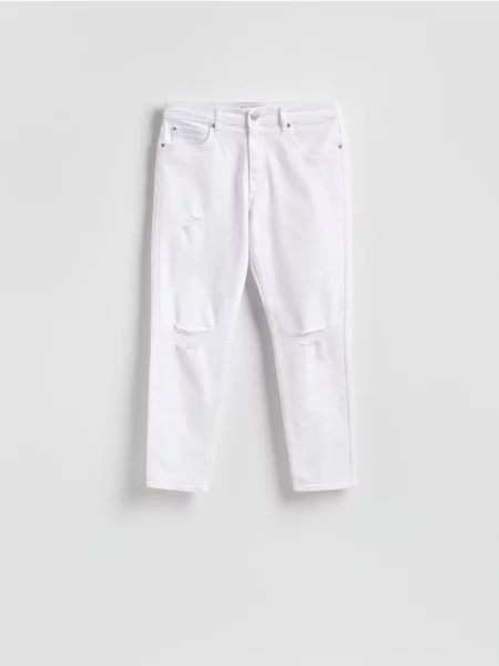 Reserved Blugi carrot slim cu aspect deteriorat alb