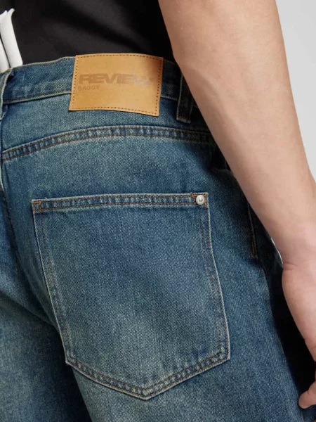Jeansy o kroju baggy Essentials Review niebieskie