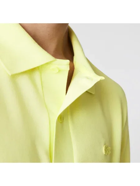 Поло Lacoste желтое