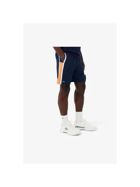Pantaloni Lacoste albastru