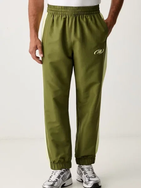 New Balance pantaloni de trening pentru bărbați verde