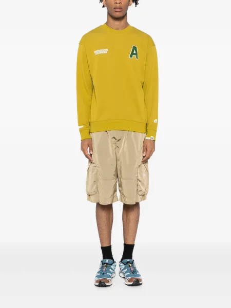 Džemperis be gobtuvo Aape By *a Bathing Ape® apvaliu kaklu geltona