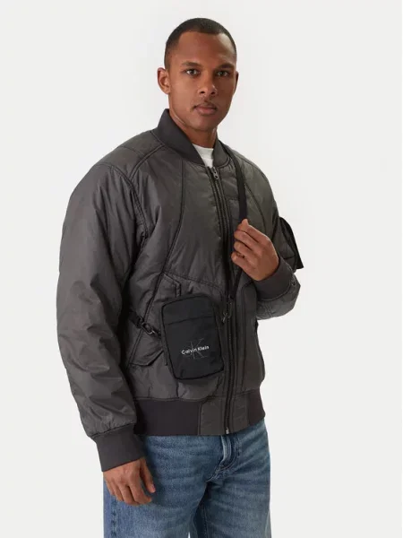 Calvin Klein Torbica za okrog pasu Bold Logo Nylon Slim Reporter črna