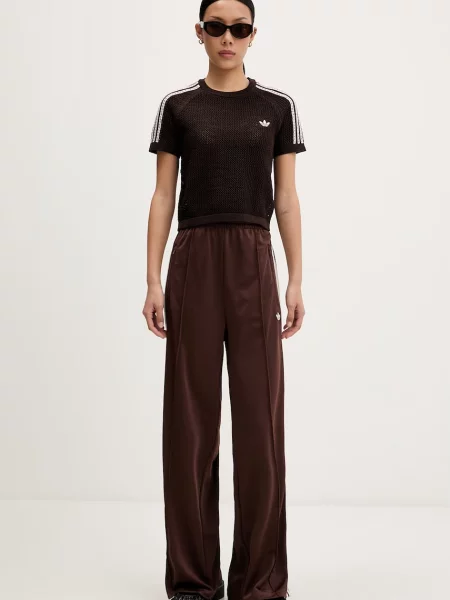 Tepláky adidas Originals Firebird Tp hnedá
