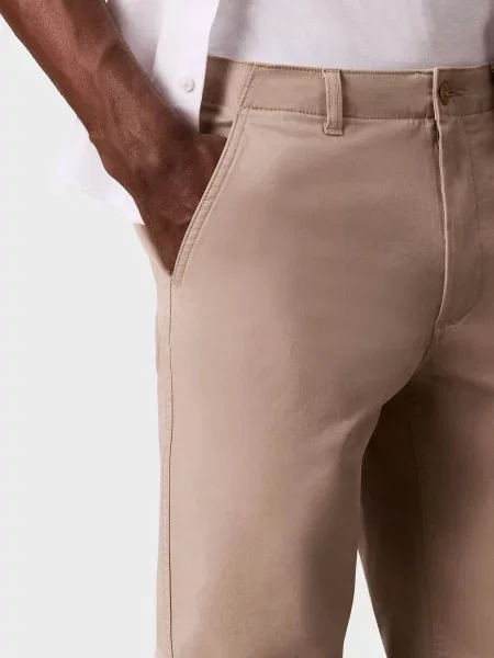 Завужені штани Calvin Klein Jeans бежеві