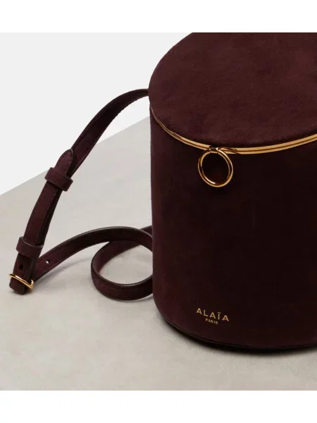 Geantă bucket Alaïa din piele de căprioară bordo