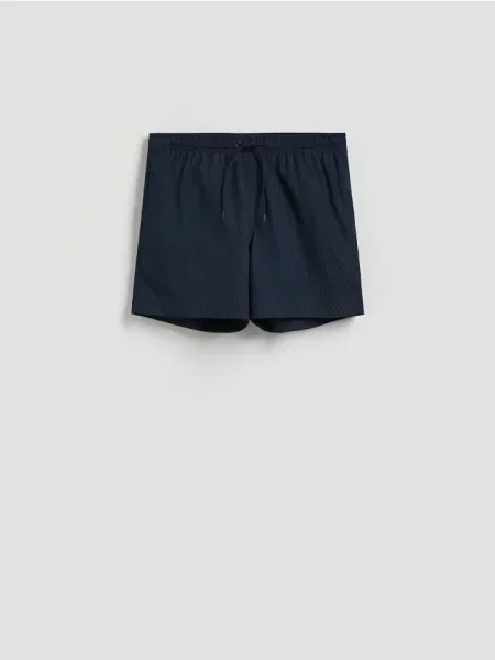 Reserved Pantaloni scurți pentru plajă din structurat bleumarin