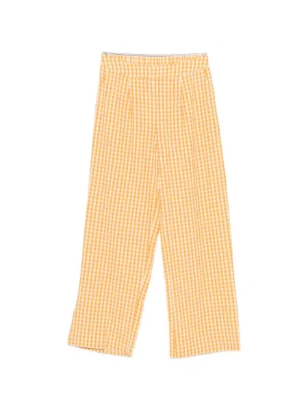 Pantaloni Maison123 în carouri galben