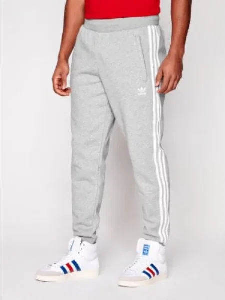 Adidas Teplákové kalhoty Classics Fitted Fit šedá