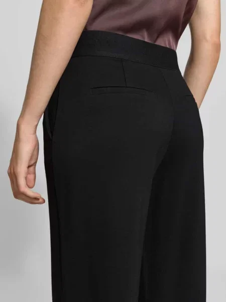 Spodnie o kroju wide fit z mieszanki Christian Berg Woman czarne