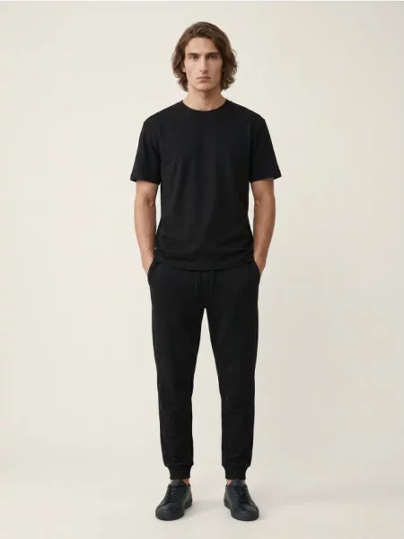 Sinsay Kalhoty Jogger slim fit černá